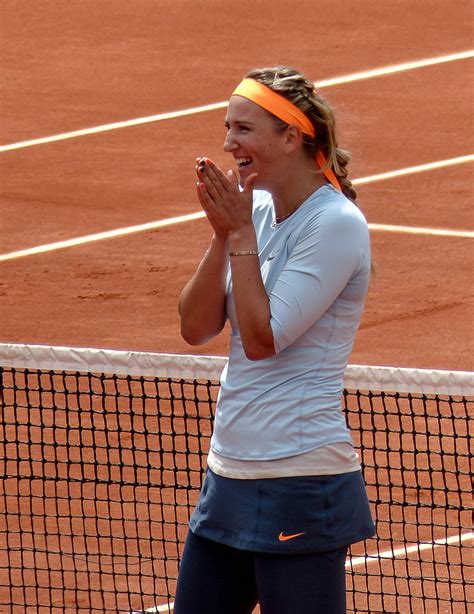 Download Victoria Azarenka With Her Hands Together Wallpaper