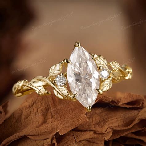 Unique Diamond Marquise Cut Engagement Ring Yellow Gold Leaf Engraved