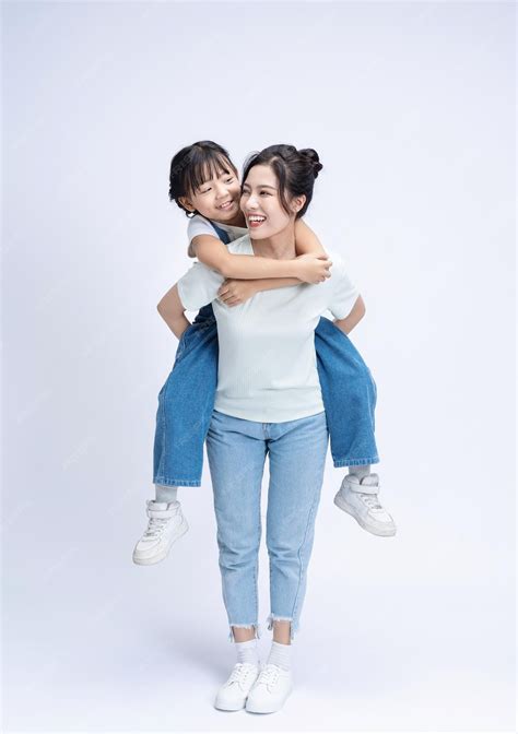 Premium Photo | Image of asian mother and daughter on background