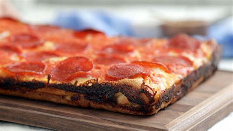 Get extra cheese in every bite with a layer of mozzarella baked into this thick crust pepperoni ...