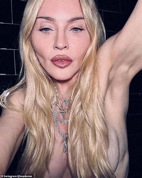 madonna   topless  shares steamy snap  rumored  toyboy