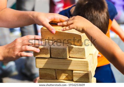 Children Build Tower Large Wooden Blocks Stock Photo 1956253609 ...