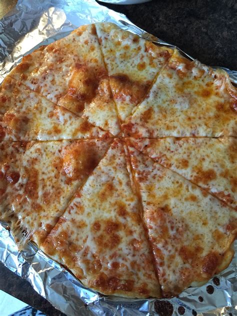 Home made pizza using some shredded provolone cheese , FRancesco ...