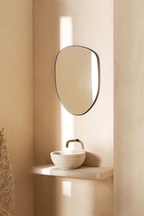 Trend Alert: Puddle-Shaped Irregular Mirrors as Decor