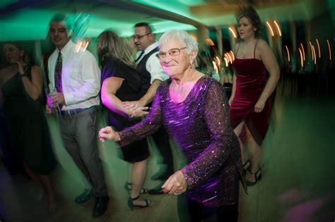An older woman dancing on the dance floor at a New York wedding