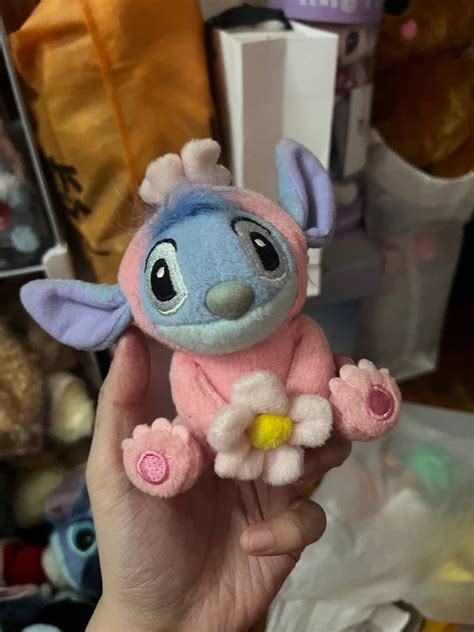 Disney Stitch with pink costume & holding flower, Hobbies & Toys, Toys ...