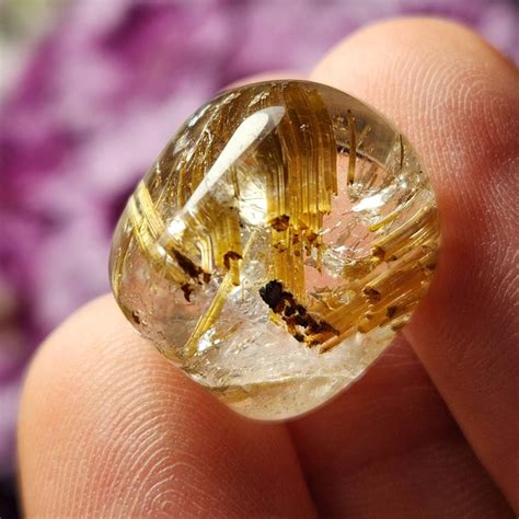 golden rutilated quartz crystal tumbled clear quartz stone etsy