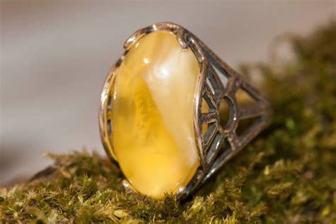 Milky amber ring. Large milky amber ring. Modern design. White amber
