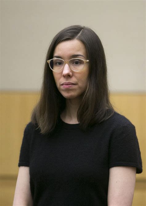 What were the last photos taken of Travis Alexander by Jodi Arias