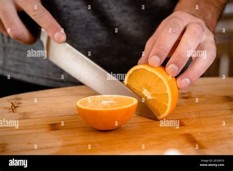 cutting  orange stock photo alamy