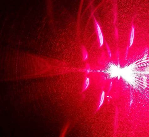 light experiments dipole electron flood theory