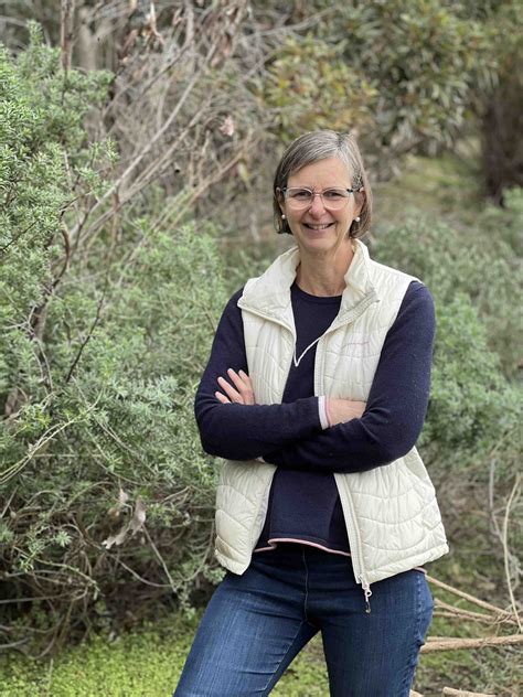 Rachel Pearce fighting invasive broom bush - Nature Conservation