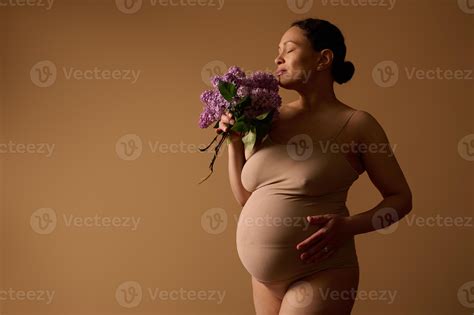 Pregnancy. Maternity. Childbearing. Body positivity. Gravid woman in