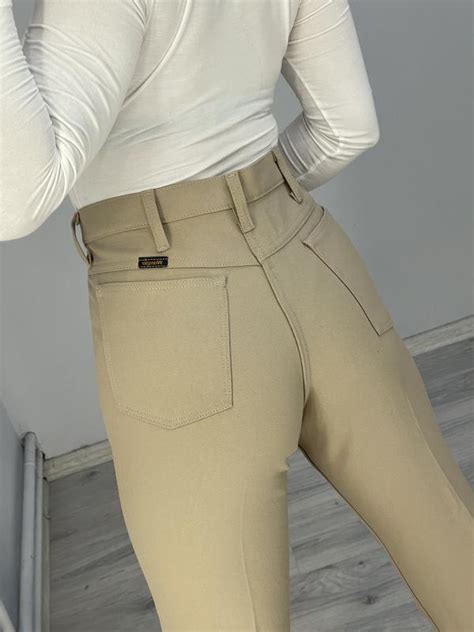 Крутые джинсы клёш wrangler — цена 845 грн в каталоге Брюки Купить ...