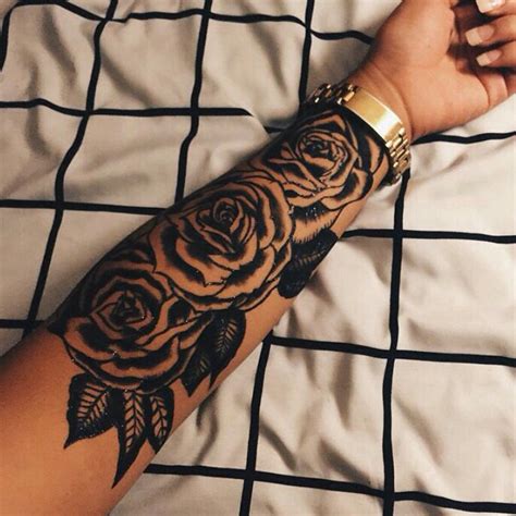 Black three roses tattoo on the left arm - Tattoogrid.net