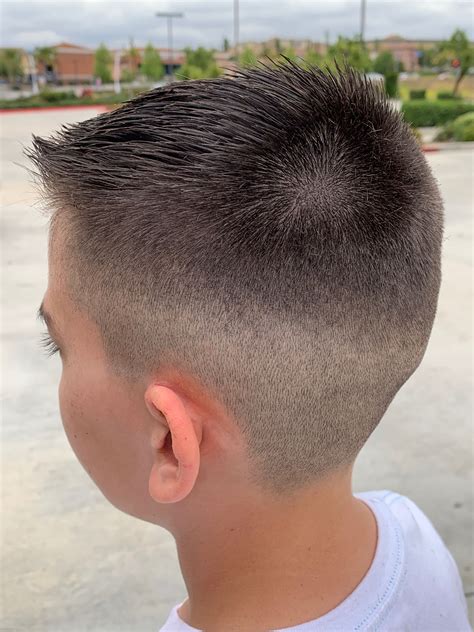 Moms are debating the best boy hair cuts for school photos