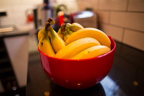 bunch  bananas  bowl stock  pictures royalty