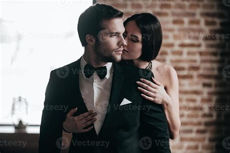 Showing her love. Close-up beautiful young woman standing behind her