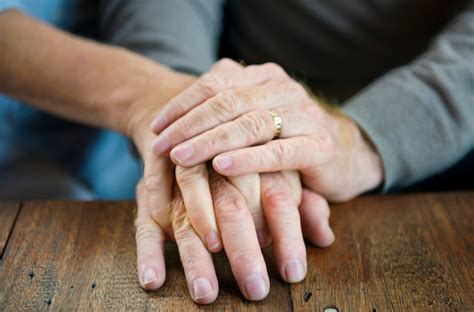 premium photo  couple hands holding