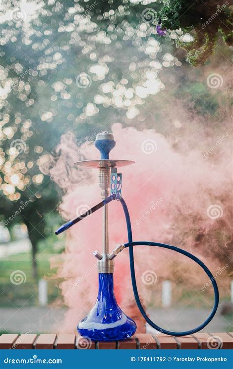 Hookah Outdoors on a Background of Colored Smoke Stock Photo - Image of ...