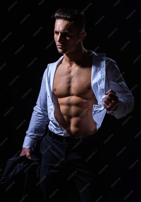 Premium Photo | Athletic young man showing his perfect naked body