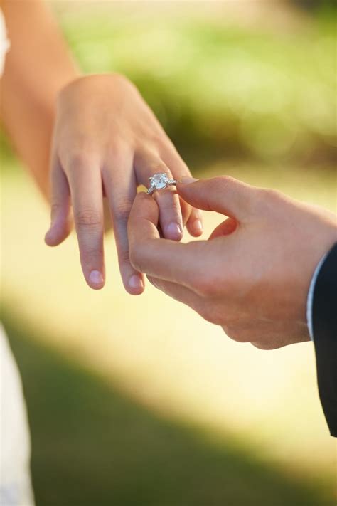 Premium Photo | Closeup wedding and hands with a ring couple or love ...