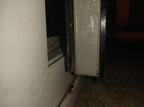 Glass in sliding glass door is popping out : r/fixit