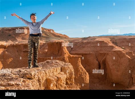 Hiker at Flaming Cliffs, Mongolia Stock Photo - Alamy