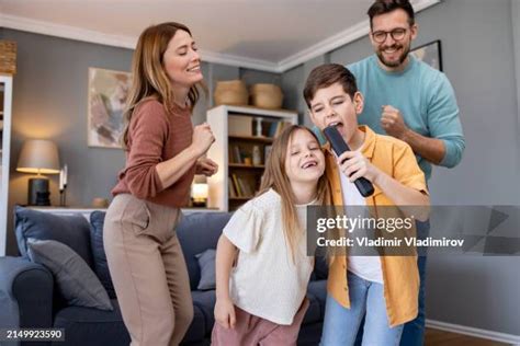 family karaoke home stock  high res pictures  images