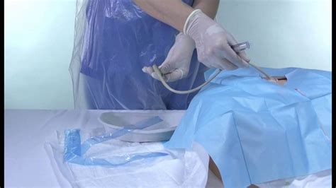 How to change a Supra-pubic Catheter - YouTube