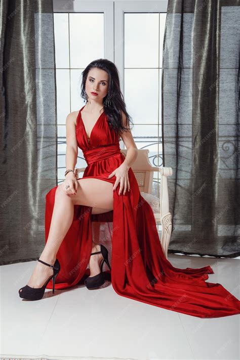 Premium Photo | Sexy glamour woman with black hair in elegant red dress