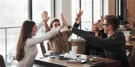 Nice work. Having fun in the office room. Friendly coworkers playing