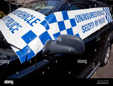 Uninsured car seized by police on display outside New Scotland Yard ...