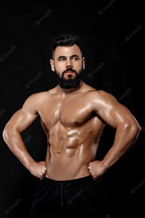 Premium Photo | Handsome strong bodybuilder posing